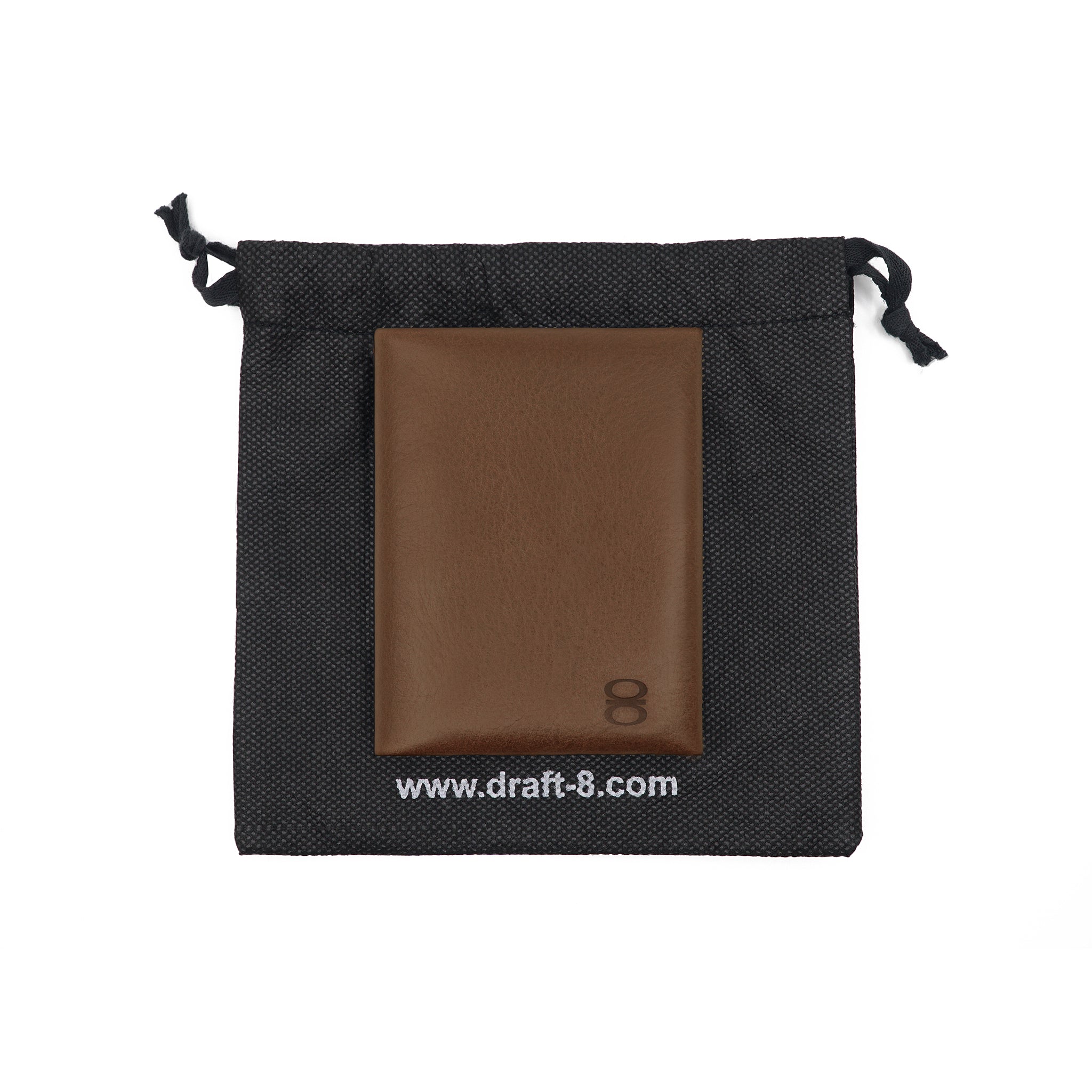 Draft-8 FOLD leather cardholder packaging with a black drawstring pouch and debossed brown wallet inside.
