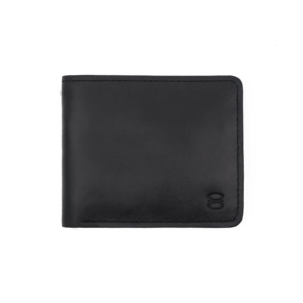 Front view of Draft-8 SWITCH wallet in black-colored vegetable-tanned leather, featuring minimalist stitching and embossed logo.
