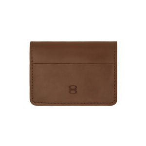 Back view of brown leather wallet by draft-8 with embossed logo

