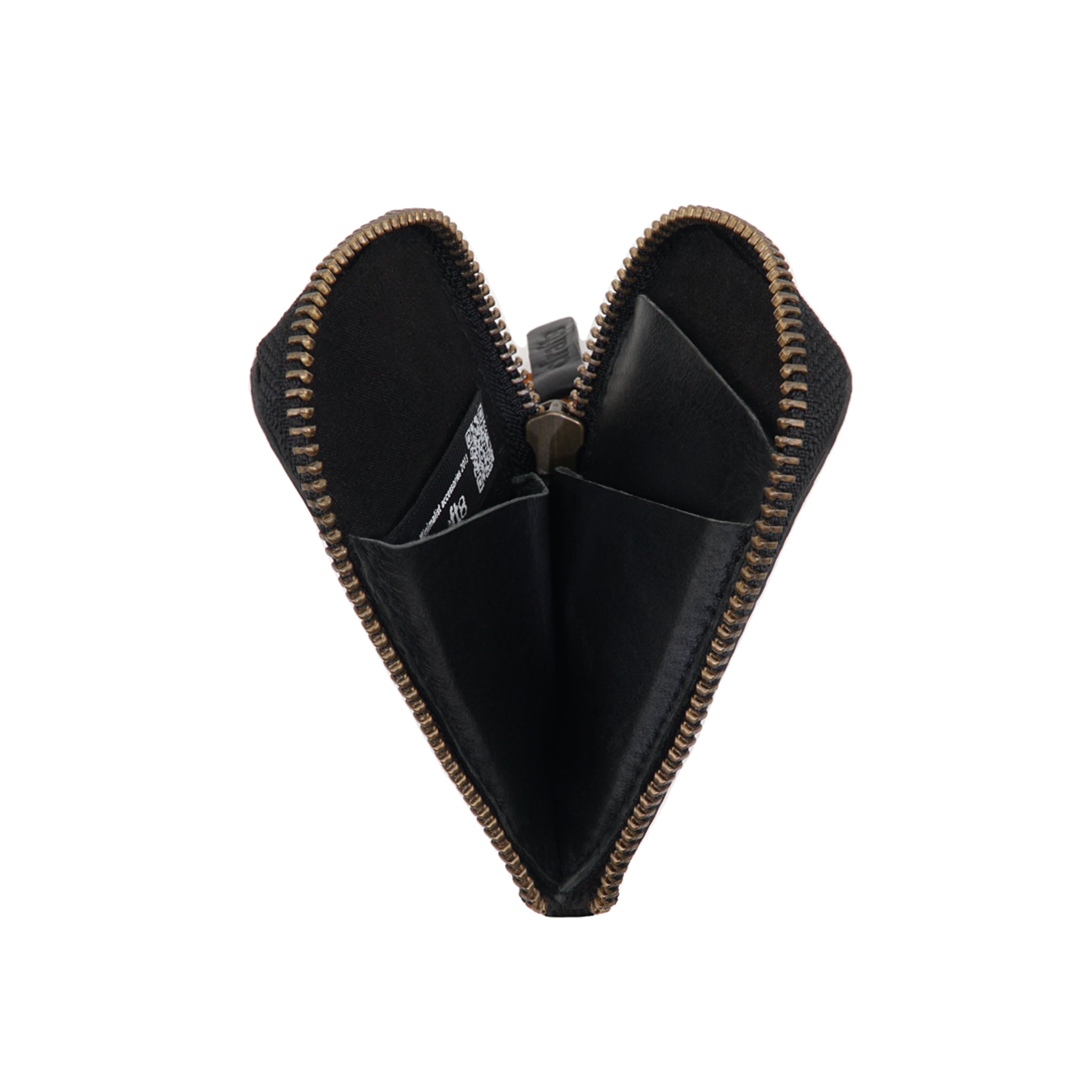 Interior view of the black leather Pop Wallet by Draft-8, unzipped to reveal compartments for cards and coins. Compact and stylish everyday carry solution.
