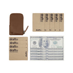 Load image into Gallery viewer, Brown leather Pop Wallet by Draft-8 shown with multiple cards and US dollar bill to demonstrate capacity and layout.

