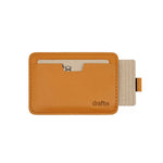 Load image into Gallery viewer, Flat view of the Draft-8 SIDE card holder in camel vegetable-tanned leather, shown with inserted demo cards and cash. Slim, practical, and eco-conscious design for minimalist everyday carry.

