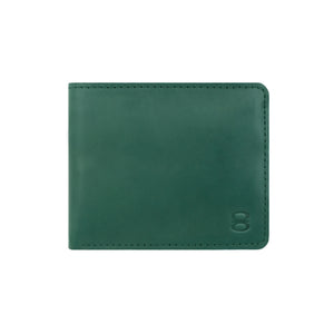 Elegant green fabric pouch with green vegetable-tanned leather patch used as premium packaging for Draft-8 wallets, showcasing sustainable materials and minimalist design. Ideal for eco-conscious gifting and brand enhancement.
