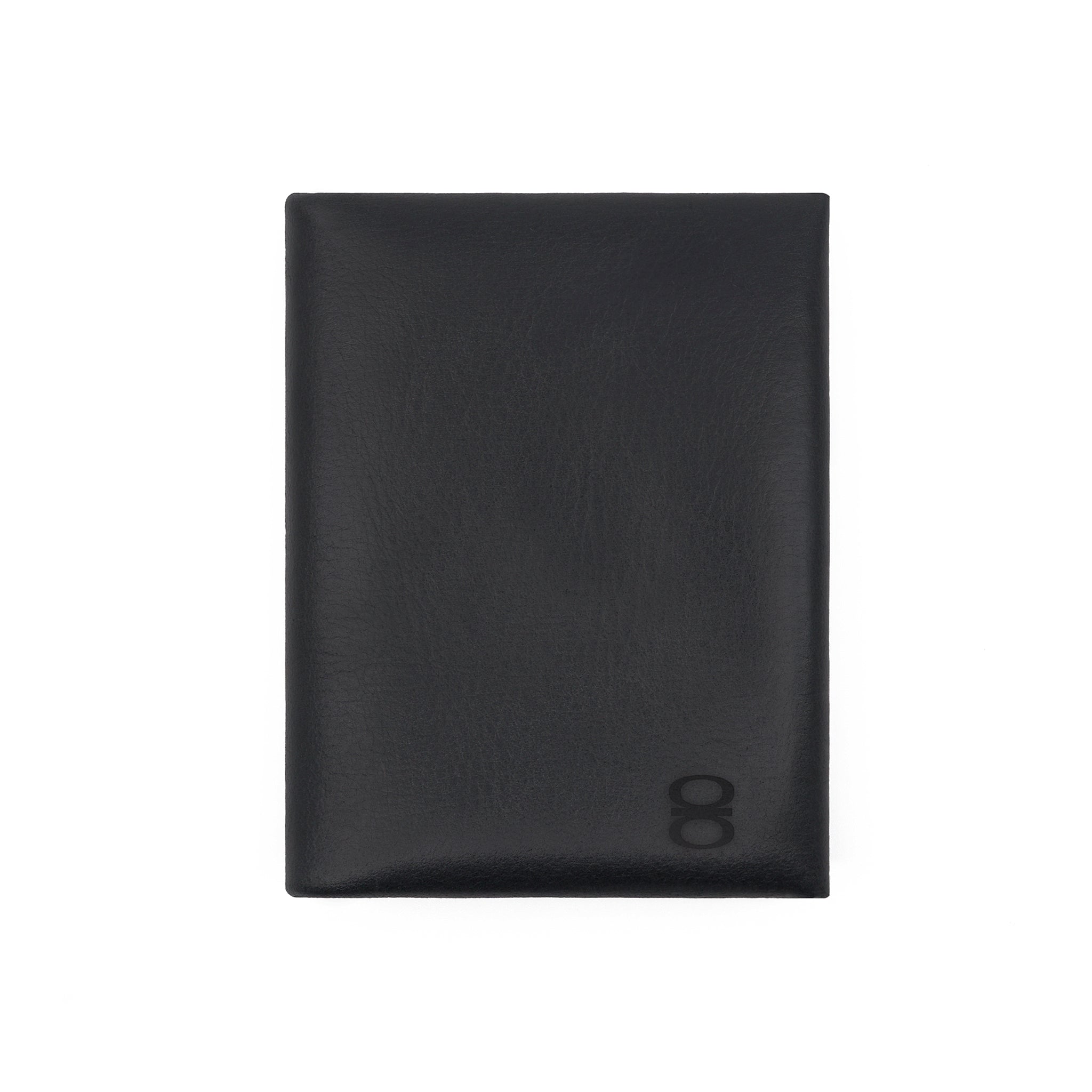 Front view of a black vegetable-tanned leather cardholder by draft-8, minimalist and refined design.