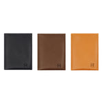 Load image into Gallery viewer, Three vegetable-tanned leather cardholders by draft-8 in black, brown, and camel, displayed side by side
