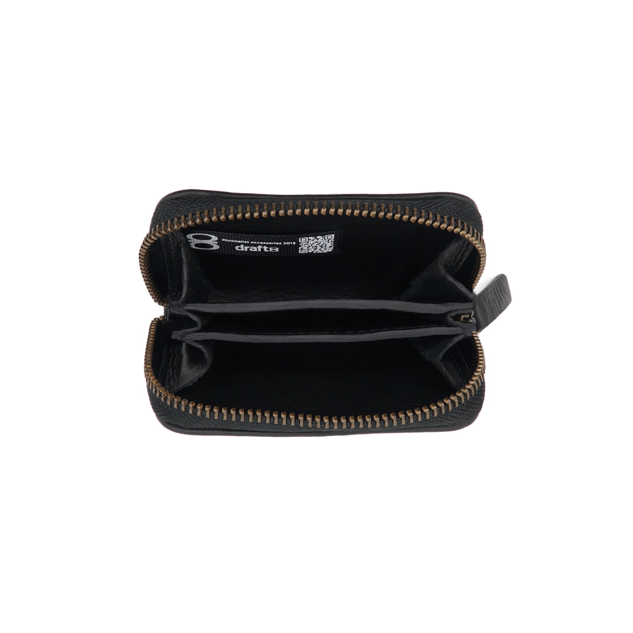 Draft-8 vegetable-tanned black leather zip wallet open to show internal compartments and coin pocket
