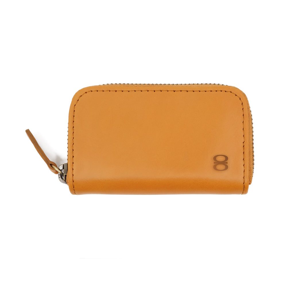 Draft-8 vegetable-tanned camel leather zip wallet closed front view with logo embossing