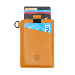 Front view of the Draft8 camel leather cardholder filled with multiple credit cards, highlighting card capacity and sleek pocket design.