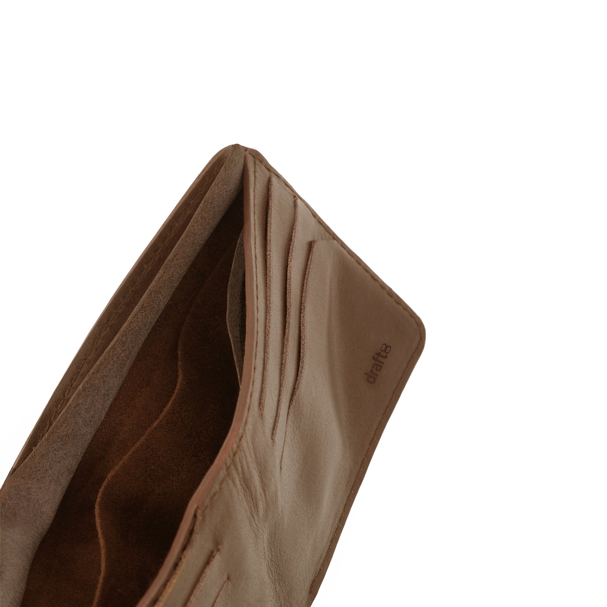 Premium brown vegan leather wallet with a secret pocket, handcrafted using natural tanning. Elegant design by Draft-8, combining functionality and sustainable materials.
